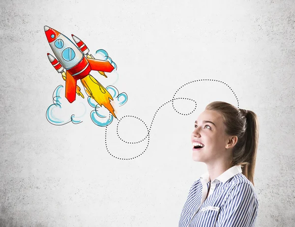 Woman and colorful rocket sketch — Stock fotografie