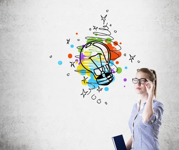 Nerd girl and light bulb sketch — Stock Photo, Image