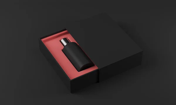 Чорна пляшка парфумів в червоно-чорній коробці — стокове фото