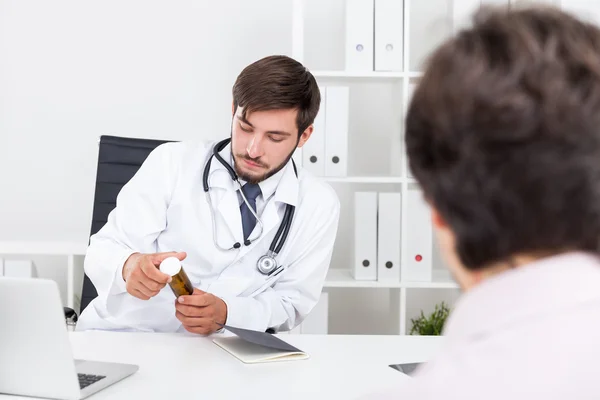 Doctor considering working in pharmacology — Stock Photo, Image