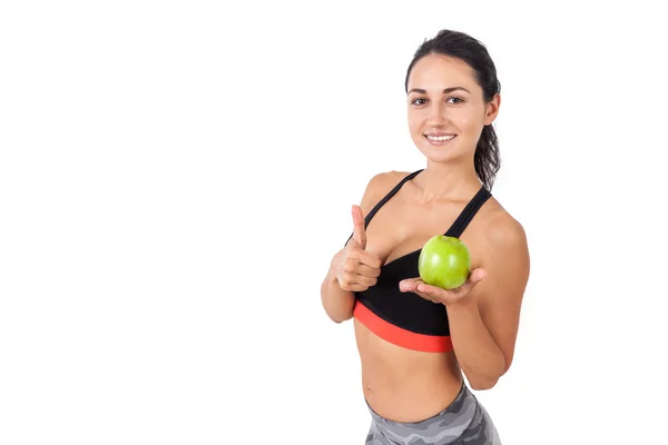 Close up of thumb up girl with an apple — Stock Photo, Image
