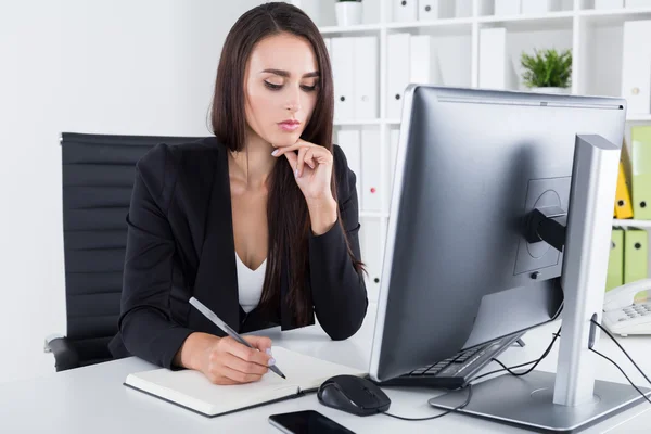 Contemplating business lady with long hair — Stock Photo, Image