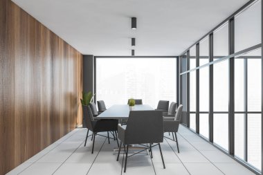 Gri ve ahşap duvarları, fayanslı zemini ve uzun konferans masası olan modern toplantı odasının içi. 3d oluşturma