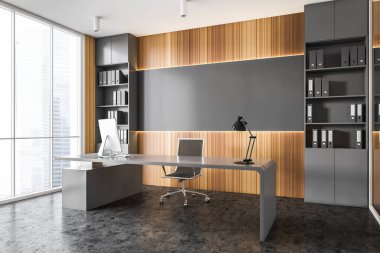 Gri ve ahşap duvarları, beton zemini ve bilgisayar masası olan şık panoramik CEO ofisinin köşesi. 3d oluşturma