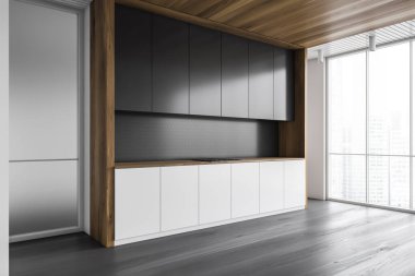 Gri duvarları, ahşap zemini, beyaz ve siyah dolapları olan şık bir mutfağın köşesi. 3d oluşturma