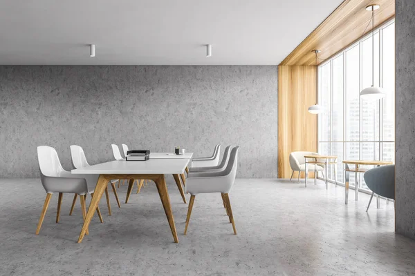 Light grey office room with white tables and chairs on wooden legs, grey marble floor with a large windows. 3D rendering of a minimalist office with no people
