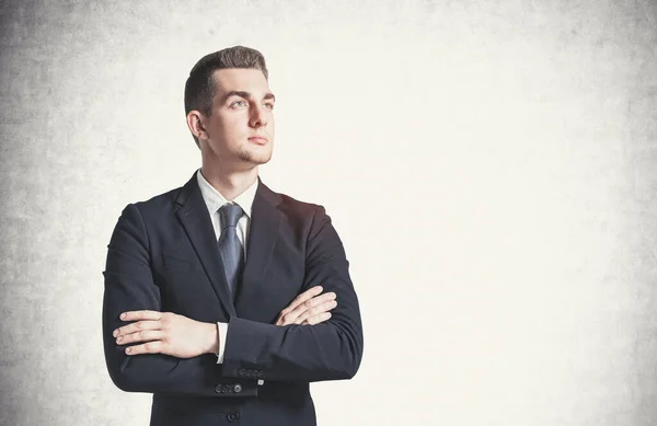 Portrait Confident Young Businessman Standing Crossed Arms Concrete Wall Concept — Stock Photo, Image