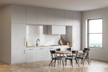 Beyaz duvarları, ahşap zemini, beyaz dolapları ve yemek masası olan modern mutfağın köşesi. 3d oluşturma