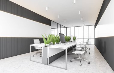 Beyaz ve gri duvarları, beton zemini ve beyaz bilgisayar tabloları olan modern açık uzay ofisinin köşesi. 3d oluşturma