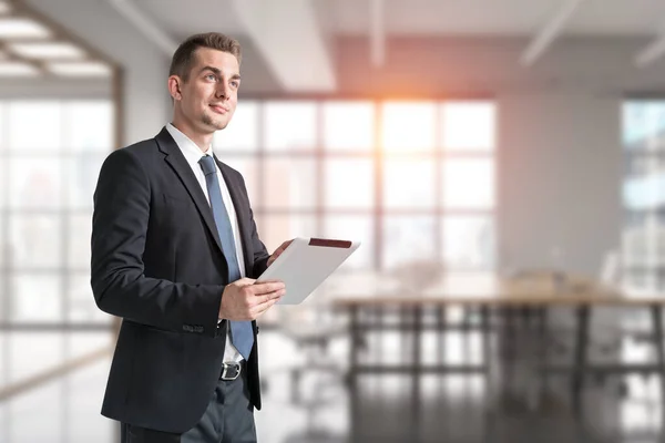 Portrait Smiling Young Businessman Using Tablet Computer Blurry Office Concept — Stock Photo, Image