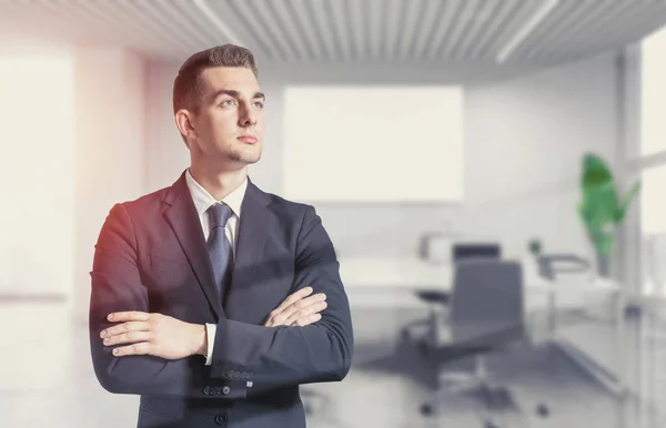 Portrait Confident Young Businessman Standing Crossed Arms Blurry Ceo Office — Stock Photo, Image
