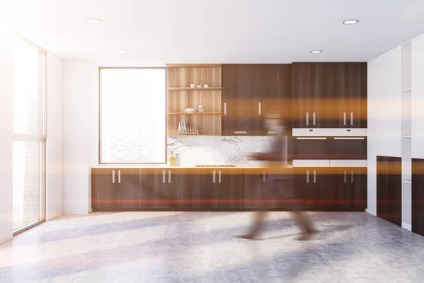 Blurry Young Businessman Walking Modern Kitchen White Walls Concrete Floor — Stockfoto
