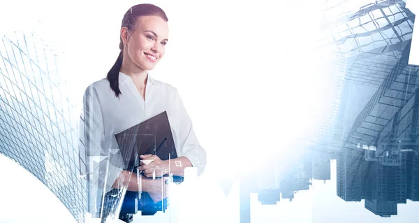 Portrait Smiling Young Businesswoman Folder Standing Blurry Abstract City Concept — Stock Photo, Image
