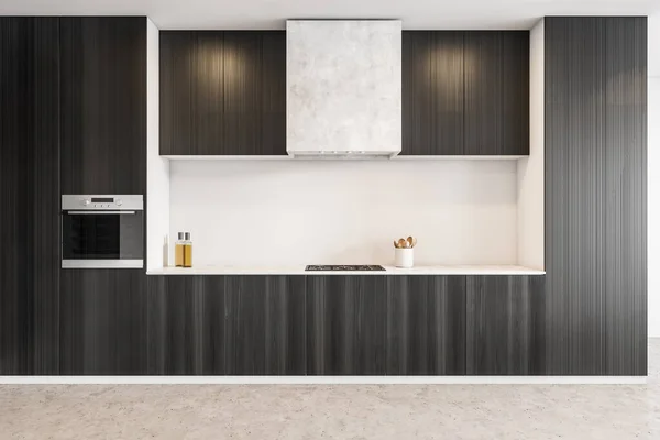 Minimalist black kitchen set front view in new modern apartment, open space kitchen on grey marble floor in flat. 3D rendering no people