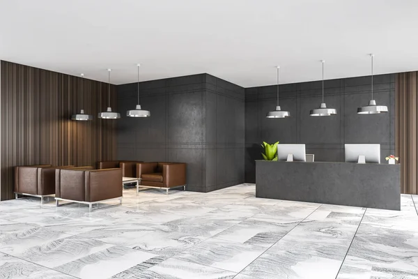 Grey reception hall, side view, with four leather armchairs for clients and desk with two computers, dark grey tiled and wooden design for business office entrance hall 3D rendering, no people