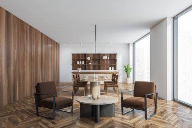 Beyaz ahşap yemek odası, iki koltuk ve sehpa, ahşap parke zemin. Tabakları ve arka planda altı sandalyesi olan oval masa, bar tezgahı ve üç boyutlu ekin.