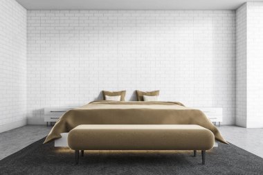 Beyaz tuğlalı duvarları, beton zemini ve bej kaplamalı rahat kral yatağı olan modern ana yatak odasının içi. 3d oluşturma