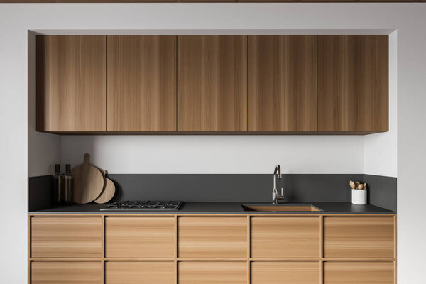 Close up of modern kitchen with white and wooden walls, concrete floor and wooden cupboards. 3d rendering