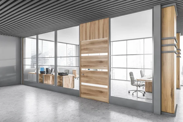 Gri ve ahşap duvarları, beton zemini ve açık uzay ofisi olan modern ofis salonunun köşesi. 3d oluşturma