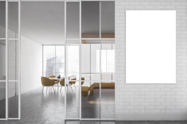 Gri duvarları, beton zemini, koltuklu yuvarlak masası ve dikey maket posteri olan modern mutfağın içi. 3d oluşturma