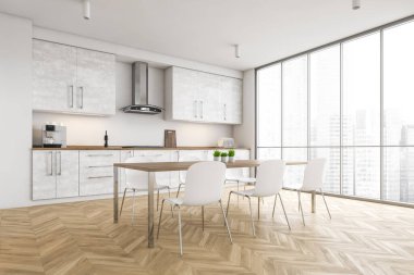 Beyaz duvarlı modern mutfağın köşesi, ahşap zemin, beyaz dolaplar ve sandalyeli yemek masası. Bulanık şehir manzaralı bir pencere. 3d oluşturma