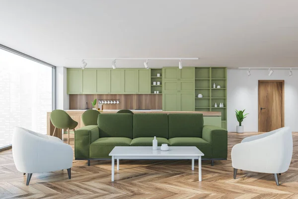 靠窗的绿色和白色客厅 配有家具和厨房 公寓工作室 沙发和扶手椅在木制木地板上 3D渲染没有人 — 图库照片