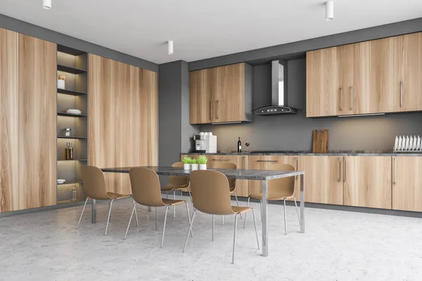 有灰色墙壁 混凝土地面 木制橱柜和有椅子的餐桌的时尚厨房角落 3D渲染 — 图库照片