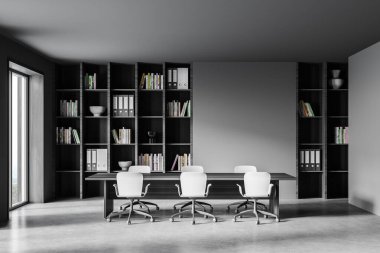 Gri duvarları, beton zemini, uzun konferans masası ve kitaplıkları olan modern toplantı odasının önü. 3d oluşturma
