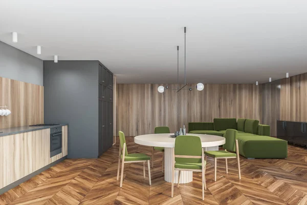 带有灰色墙壁 木制地板 木制橱柜和有绿色椅子的餐桌的现代厨房侧视图 3D渲染 — 图库照片