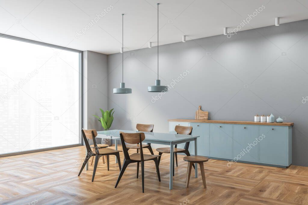 Grey and wooden dining room with minimalist wooden chairs and light blue table, side view. Modern design of eating room with window, wooden parquet. 3D rendering no people