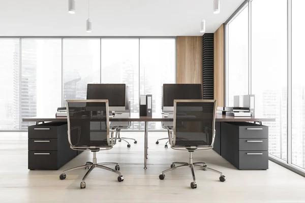 Interior of stylish open space office with gray and wooden walls, wooden floor and gray computer tables. 3d rendering