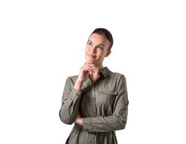 Haki gömlekli düşünceli genç Avrupalı iş kadını portresi. Karar verme kavramı