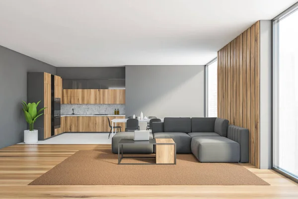 灰色客厅与灰色沙发和木制咖啡桌 地毯在木制地板上 带有架子的木制厨房背景 3D显示没有人 — 图库照片