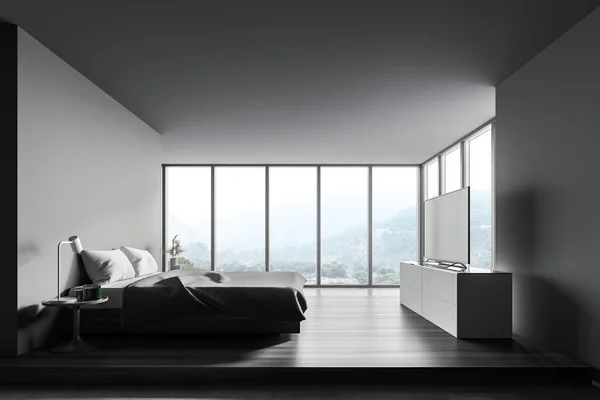 グレーの壁 コンクリートの床 快適なキングサイズベッドとテレビセットとパノラマのベッドルームのインテリア 3Dレンダリング — ストック写真