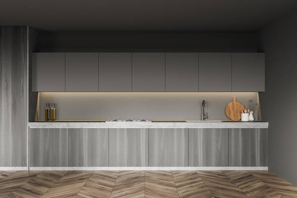 Interior of modern kitchen with gray walls, wooden floor and wooden cupboard. 3d rendering