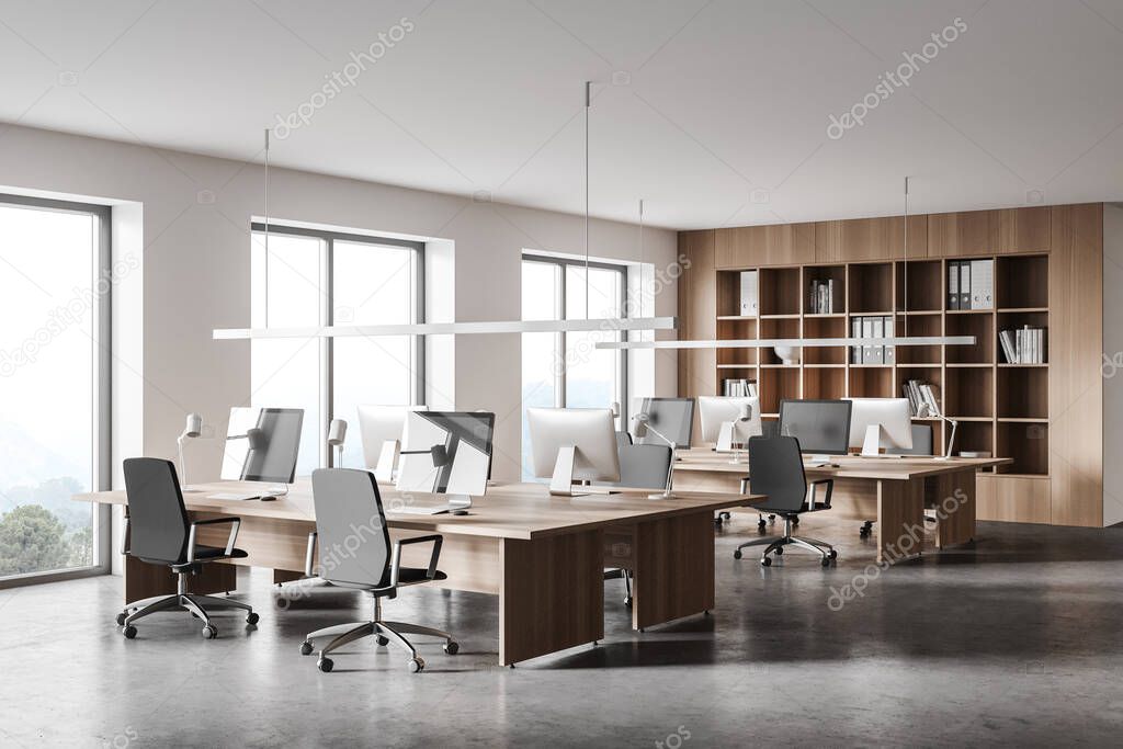 Corner of modern open space office with white and wooden walls, concrete floor and rows of computer tables. 3d rendering