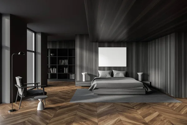 Interior of stylish master bedroom with gray and wooden walls, wooden floor, comfortable king size bed, armchair and horizontal mock up poster. 3d rendering