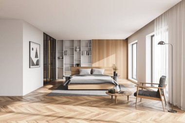 Beyaz ve ahşap duvarları, ahşap zemini, rahat kral yatağı, bir kitaplık ve gri koltuğu olan şık bir yatak odası. 3d oluşturma