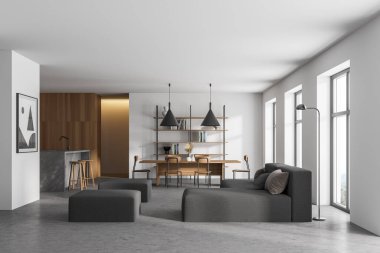 Beyaz ve ahşap duvarları, beton zemini, gri kanepesi ve arka planda bar olan mutfağı olan şık bir oturma odası. 3d oluşturma