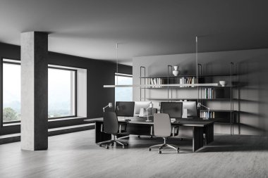 Gri duvarları, beton zemini, uzun bilgisayar masaları ve bulanık dağ manzaralı pencereleri olan modern açık uzay ofisinin köşesi. 3d oluşturma