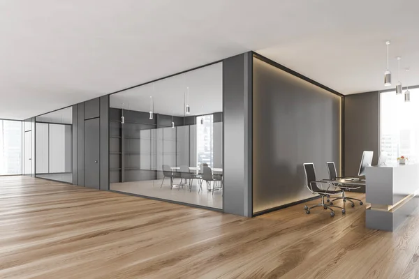 Black and wooden reception room with two computers, conference office room. Black wall with backlight, business office hall, side view, parquet floor 3D rendering, no people