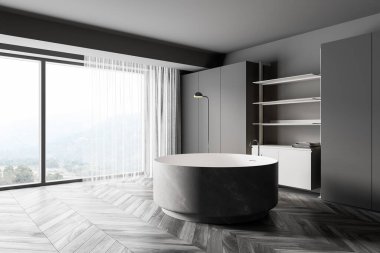 Gri duvarları, koyu ahşap zemini, yuvarlak küveti ve beyaz rafları olan şık bir banyonun köşesi. Bulanık dağ manzarası. 3d oluşturma