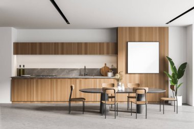 Ahşap ve beyaz duvarları, beton zemini, yemek masası ve kare şeklindeki posterleri olan modern mutfağın içi. 3d oluşturma