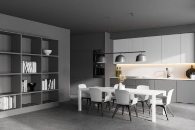 Gri ve beyaz duvarları olan modern mutfağın köşesi, beton zemin, gri ve sarı dolaplar ve uzun yemek masası. 3d oluşturma