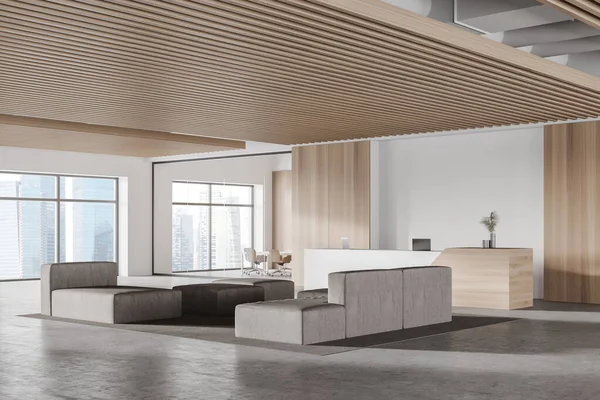 Modern ofis bekleme odasının köşesinde beyaz ve ahşap duvarlar, beton zemin, gri kanepeler ve resepsiyon masası. 3d oluşturma