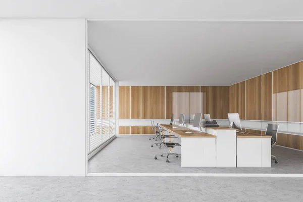 Mockup copy space near grey wooden office room with chairs, computers on wooden tables behind glass windows. Marble floor, 3D rendering no people