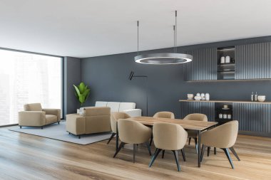 Mutfak seti ve yemek masası olan gri oturma odası, arka planda bej kanepe ve koltuklar, parke zemin. Açık uzay yemek odası 3D, kimseyi görüntülemez.