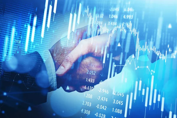 Double exposure of businessman handshake on stock market graph background. Concept financial transaction and deal processing.