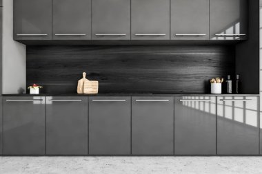 Siyah ve gri minimalist mutfak seti, aletler ve soba, ön manzara. Mermer zeminde koyu lüks mutfak, 3 boyutlu, insan yok.