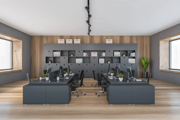 Office room with armchairs and computers on black tables near window. Wooden and black manager room with modern minimalist furniture, 3D rendering no people